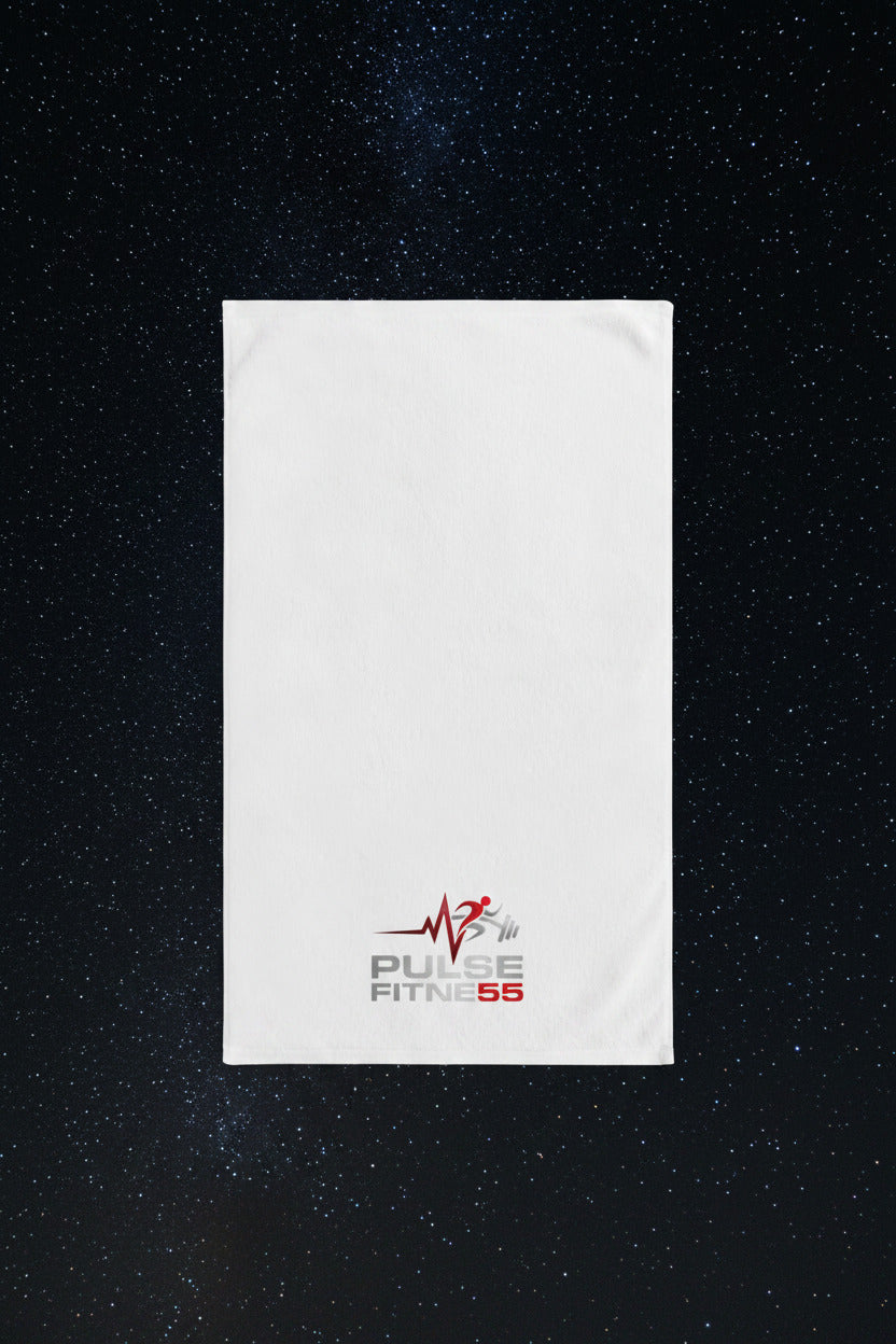 White towel with Pulse Fitness 55 logo on a white background