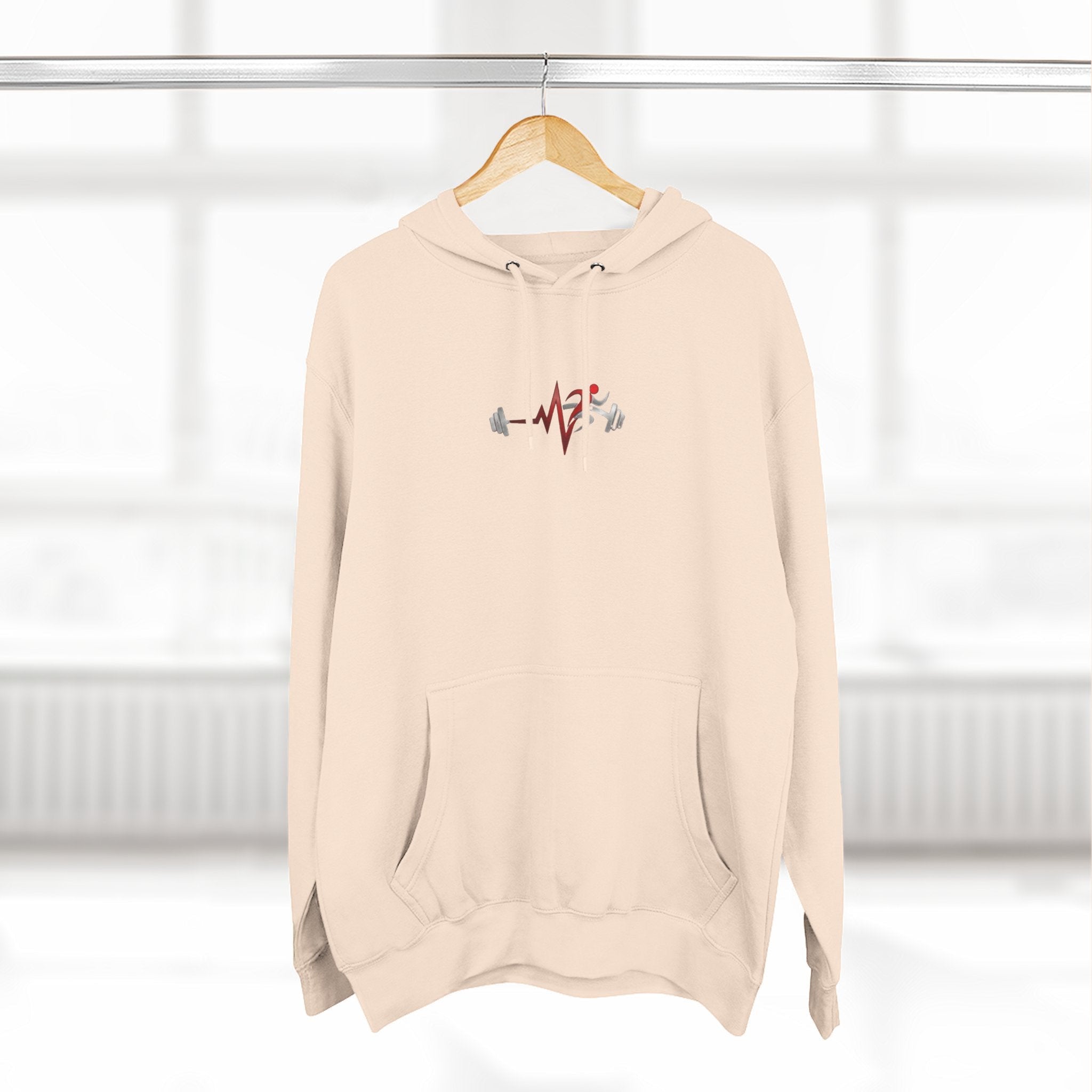 Pulse Fitne55 light peach fleece pullover hoodie with adjustable hood and kangaroo pocket, featuring a chest graphic.